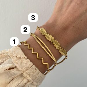 PULSERA ACERO DORADO