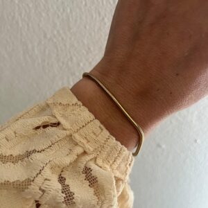 PULSERA ACERO DORADO