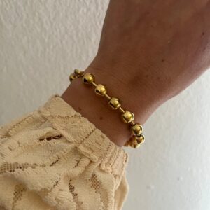 PULSERA ACERO DORADO