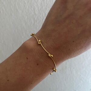 PULSERA ACERO DORADO