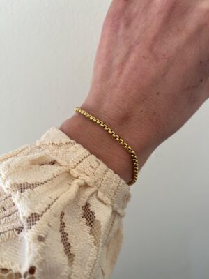 PULSERA ACERO DORADO