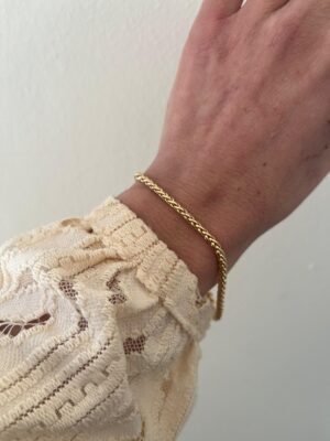 PULSERA ACERO DORADO